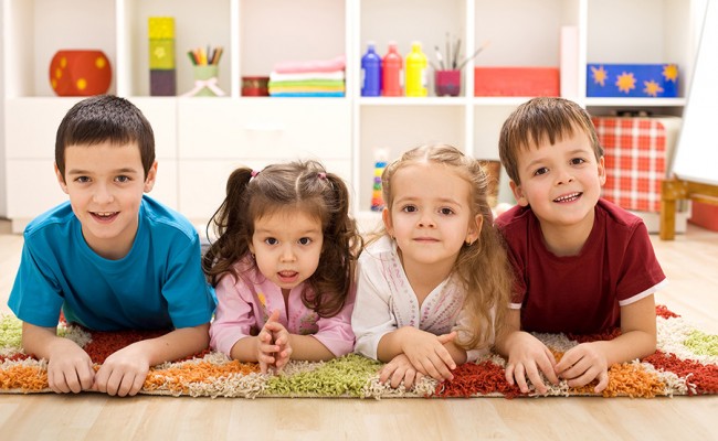 Kids in their room ready for their closeup